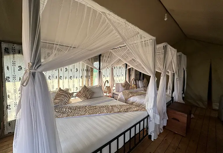 Osinon Serengeti Camp luxury tent bed
